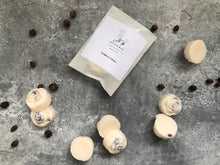 Load image into Gallery viewer, myrrh and tonka wax melts flat lay with label
